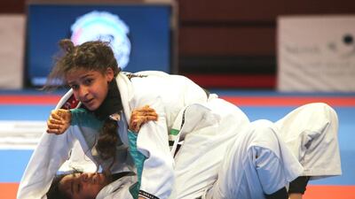 Fatima Al Marar of the UAE shown in her match with Asma Al Hosani (on top) of the UAE in the Abu Dhabi World Youth Jiu-Jitsu Championship 2016. Ravindranath / The National