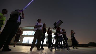A long exposure picture shows stargazers at Al Thuraya Astronomy Center in Dubai. EPA/ALI HAIDER