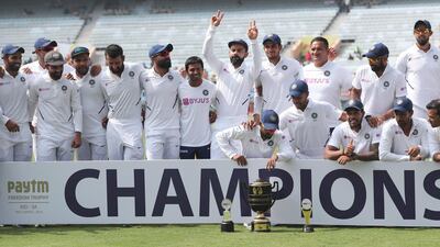 The India squad, with captain Virat Kohli flashing the victory in the back row, celebrate after clinching a 3-0 series win over South Africa in Ranchi, on Tuesday, October 22. AP