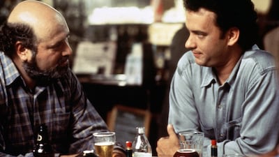 Reiner played alongside Tom Hanks as an actor in Sleepless in Seattle (1993). AFP