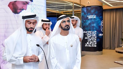 Sheikh Mohammed bin Rashid, Sheikh Ahmed bin Mohammed, Chairman of the Mohammed bin Rashid Al Maktoum Knowledge Foundation, and Mohammed Al Gergawi, Minister of Cabinet Affairs and the Future, visit the Service 1 centre in Emirates Towers on Saturday. Wam
