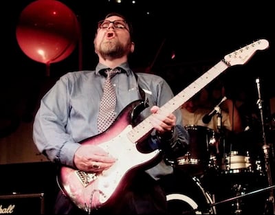 Allen joins in with the band in Seattle. AP