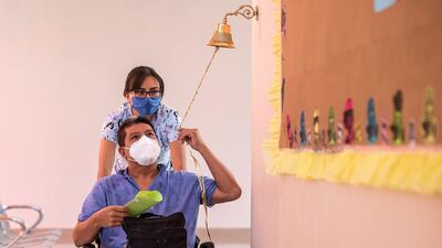 A cured patient from Covid-19 rings a bell as a sign of victory when he leaves the hospital in Saltillo, Mexico. EPA