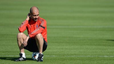 Bayern Munich manager Pep Guardiola shown at the team's training session on Monday ahead of their Tuesday Champions League quarter-final second leg against FC Porto. Andreas Gebert / EPA / April 20, 2015
