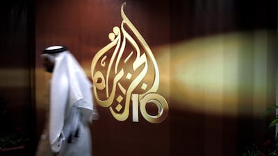 The Qatar-based Al Jazeera news channel accused Egypt on Monday of detaining one of its producers on 'fabricated charges'. Kamran Jebreili, File/AP Photo