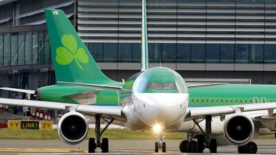 An Aer Lingus plane taxis before take off at Dublin airport. Cathal McNaughton / Reuters