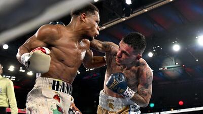 Devin Haney and George Kambosos trade punches during their undisputed lightweight bout. AFP
