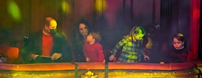 The Duke and Duchess of Cambridge with their children watching 'Pantoland' in London on December 11, 2020. AFP