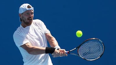 Alex Bogomolov Jr triumphed in his first-round match at the Australian Open.