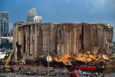 epa08798579 A view of the damaged grain silos at the destroyed port area, three months after a huge explosion hit the city in Beirut, Lebanon, 04 November 2020. At least 190 people were killed and more than six thousand injured in the Beirut blast that devastated the port area on 04 August and believed to have been caused by an estimated 2,750 tons of ammonium nitrate stored in a warehouse. EPA/WAEL HAMZEH
