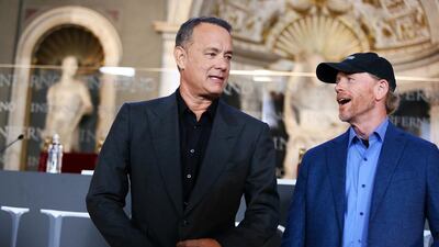 Actor Tom Hanks, left, and director Ron Howard. Ernesto Ruscio / Getty Images