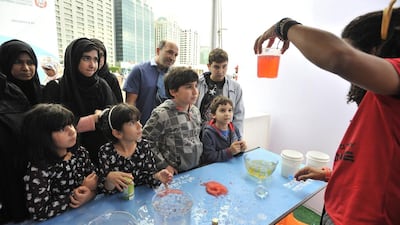 Visitors watch a science demostration at the Abu Dhabi Science Festival. Charles Crowell for The National
