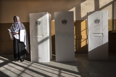 An Afghan woman goes to cast her vote in a key presidential election in Kabul, Afghanistan. Getty
