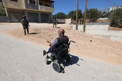 Israeli soldiers in Qusra, south of Nablus, in the occupied West Bank. EPA