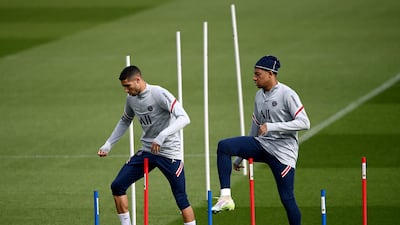 Achraf Hakimi and Kylian Mbappe during training. AFP