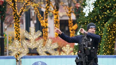 A Niagara Falls Police officer directs tourists away from the border crossing. The Buffalo News / AP