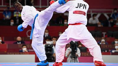 Saudi Arabian karate star Tareg Hamedi (L) won silver in the men's kumite +75kg event.