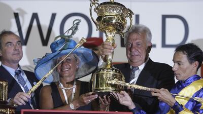 Stefan Friborg, second right, celebrates winning the 2010 Dubai World Cup at Meydan. Kamran Jebreli / AP Photo