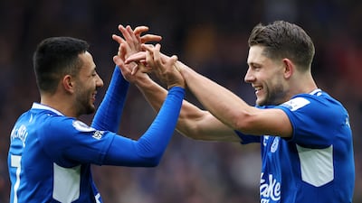 James Tarkowski celebrates with Dwight McNeil. Getty