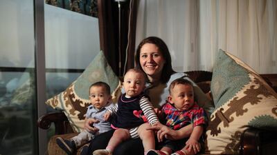 Fatima Tomoum, mother of 14-month-old triplets Ali, Maryam and Yousef, has taken breast milk donations when she has been unable to produce enough milk for her babies. She is still searching for a long-term donor. Sarah Dea / The National