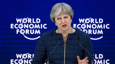 Britain's premier Theresa May told Bloomberg in Davos that she was "appalled" by the behaviour at a charity ball attended by one of her ministers. AFP PHOTO / Fabrice COFFRINI