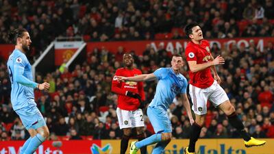 Burnley's Chris Wood begins his celebration after opening the scoring. Reuters