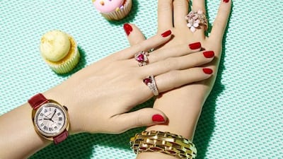 From left, Clé de Cartier watch, Dh152,000, Cartier. Butine ring, Dh63,900, Chaumet. Serpenti ring, Dh90,000, Bvlgari Josephine Aube Printaniere ring, Dh123,600, Chaumet. Ring with cushion-cut diamond, Dh278,500, Chaumet. Paris Nouvelle Vague bracelet, Dh160,000, Cartier.