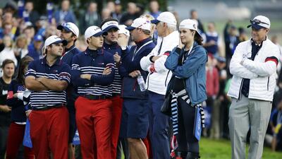 US captain Tom Watson, right, and team members were in the gallery for the winning chip by Europe’s Jamie Donaldson against Keegan Bradley. Matt Dunham / AP Photo