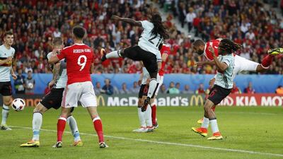 Wales captain and defender Ashley Williams scores the equalising goal. John Sibley / Reuters