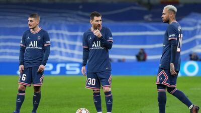 Marco Verratti, Lionel Messi and Neymar of Paris Saint-Germain look dejected as they exit the Champions League. Getty
