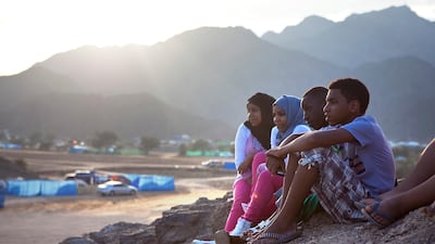 Families from all over the emirates enjoy a day off in celebration of Eid Al Adha at Dibba Beach. Silvia Razgova / The National