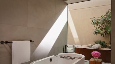 The main bathroom spans three areas