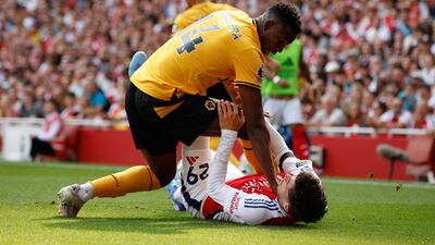 Arsenal's Kai Havertz clashes with Mosquera of Wolves. EPA