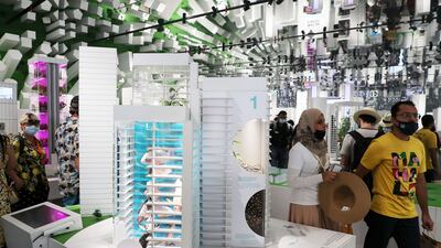 Visitors look into the future at the Germany pavilion.