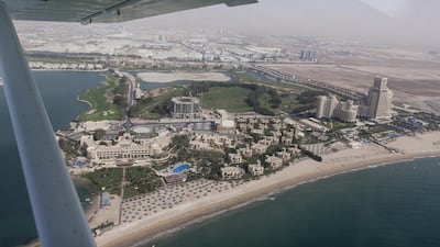 Al Jazira Aviation Club is the company behind the flights. It has about eight 450kg planes, which can hold one passenger and a pilot, and can cruise at about 140kph.