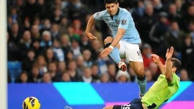 Manchester City's Sergio Aguero scores his sides fourth goal. Peter Powell / EPA