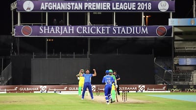 Gulbadin Naib of Balkh takes the wicket of Mohammad Shahzad of Paktia. Chris Whiteoak / The National