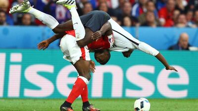 France midfielder Paul Pogba and Breel Embolo of Switzerland compete for the ball. Paul Gilham / Getty Images