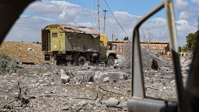 Debris scattered at the site of an Israeli strike on a military airbase near Hama in Syria this week. AP