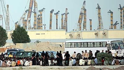 Labourers stage a peaceful protest near Dubai Investment Park over non-payment of wages.