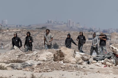 Israeli settlers in the occupied Palestinian village of Jannatah, just south of Bethlehem. AFP