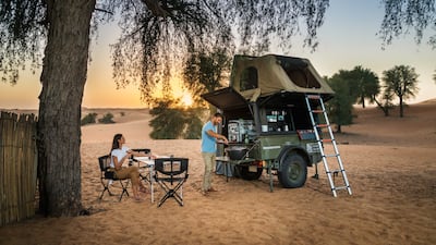 Sand Sherpa's camping trailers are equipped with a rooftop tent, outdoor sofa, firepit and bedding. Photo: Sand Sherpa