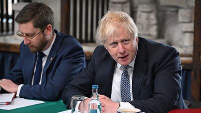 Britain's Prime Minister Boris Johnson with the head of the Civil Service, Simon Case, at a meeting in Stoke on Trent. Getty