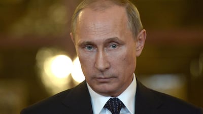 Vladimir Putin is facing scrutiny over whether Russia played a part in the shooting down of Malaysian Airlines flight MH17 over eastern Ukraine. Photo: AFP / Alexei Nikolsky