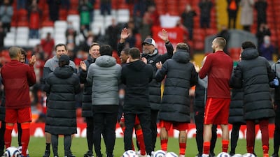 Liverpool's Georginio Wijnaldum is given a guard of honour after the match. PA