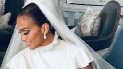 Jennifer Lopez wore a total of five wedding dresses over the course of two ceremonies, including this look by Ralph Lauren. Photo: On The JLo