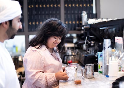 Amna Al Mullah's trademark iced karak is proving popular with customers. Reem Mohammed/The National