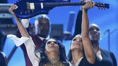 Musician Sheila E holds aloft a Prince styled guitar after she performed a medley of songs during her tribute to the artist at the 2016 BET Awards. Danny Moloshok / Reuters