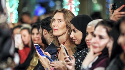 Guests watch the Dolce & Gabbana Fashion Show at Dubai Mall.