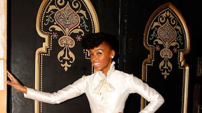 Janelle Monae, wearing a white blouse with a tutu and tights, at the Atlanta Ballet on April 10, 2008. WireImage